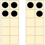 Image of 7 counters arranged across 2 tens frames (i.e. as 4 + 3).